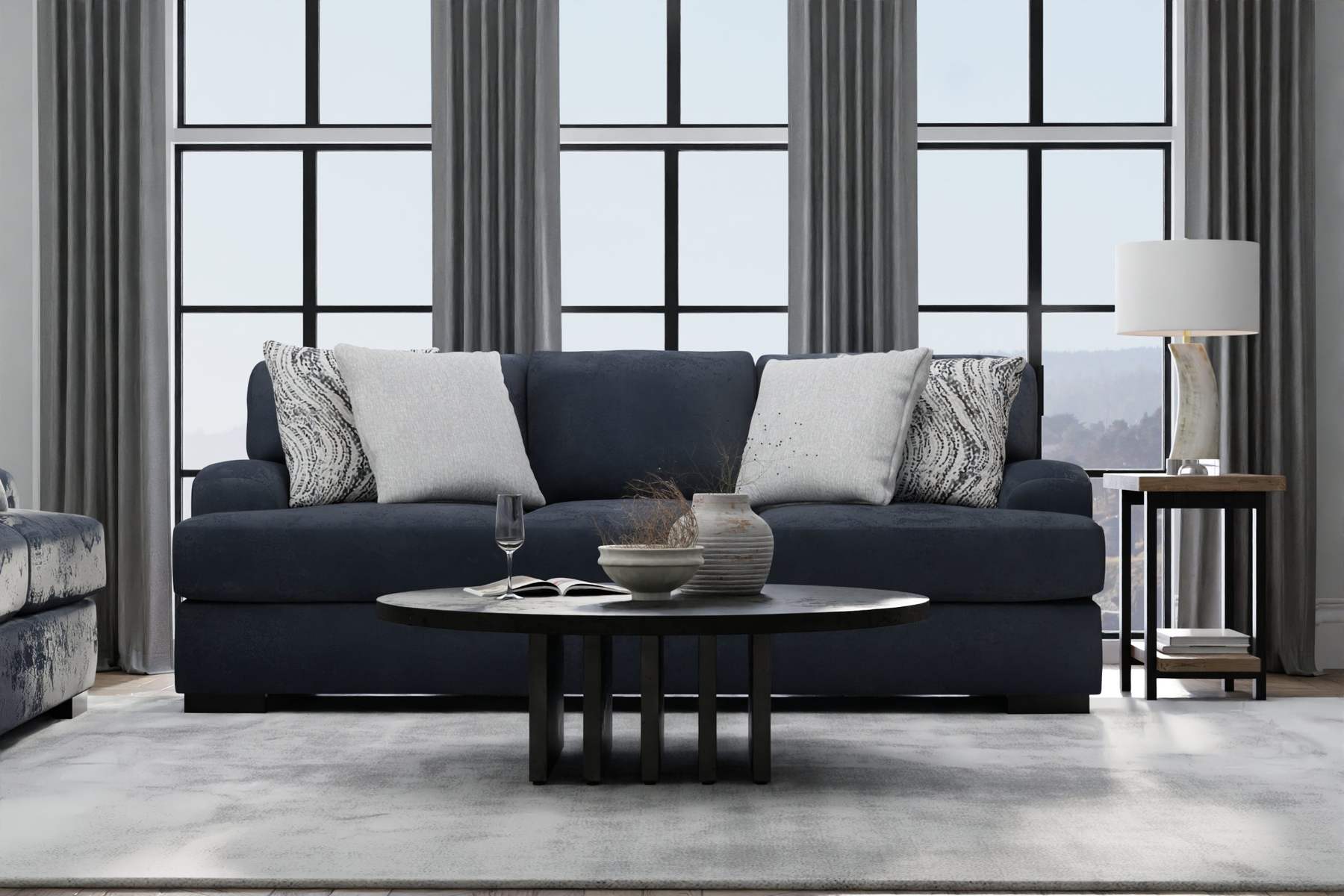 Navy sofa in a sunlit room